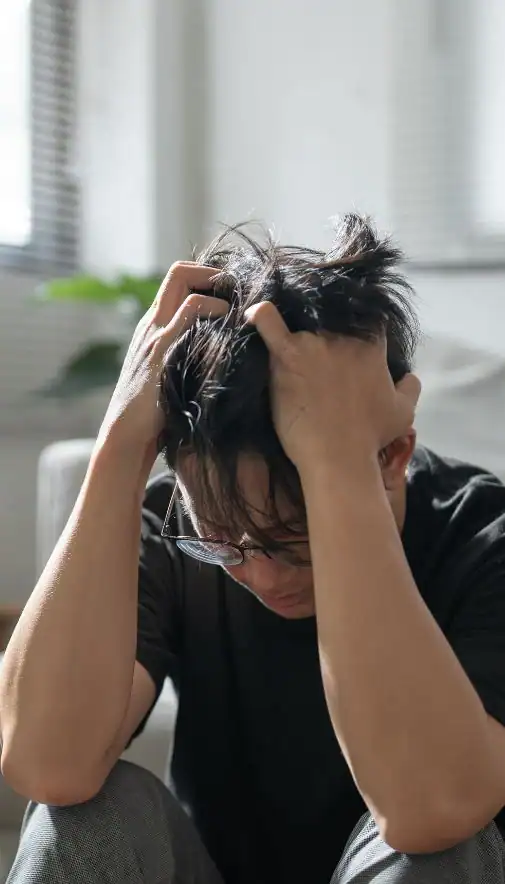 Image of upset man because of erectile dysfunction symptoms Reading