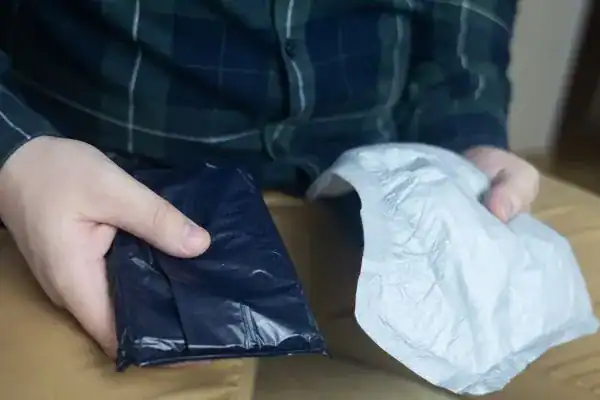 image of man holding stool incontinence Reading products